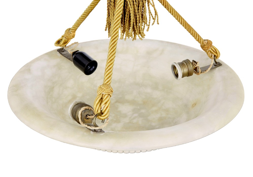 An Art Deco carved alabaster bowl pendant light suspended by braided gold ropes with decorative tassels. View III