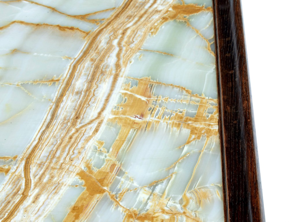 A 19th-century dark oak rectangular side table featuring a polished green and beige onyx top, carved cabriole legs, and ball-and-claw feet. View IV