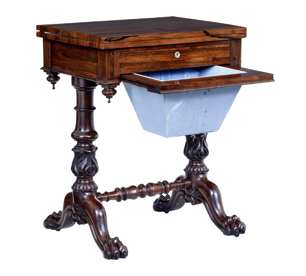 A 19th-century William IV palisander flip-top side table featuring carved legs, claw feet, a single drawer, and a suspended work well beneath. View III