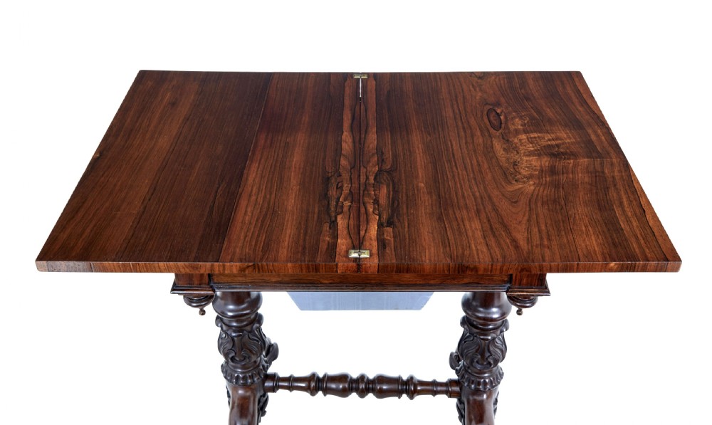 A 19th-century William IV palisander flip-top side table featuring carved legs, claw feet, a single drawer, and a suspended work well beneath. View VIII
