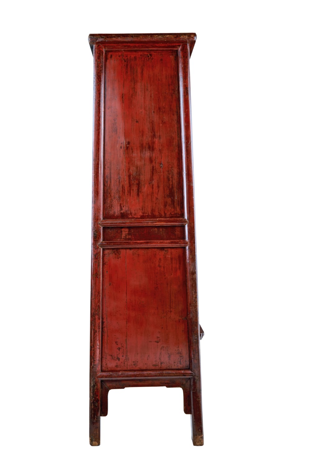 A tall 19th-century Chinese red lacquer cupboard with two panelled doors, metal lockplates, and a shaped lower apron. View IV