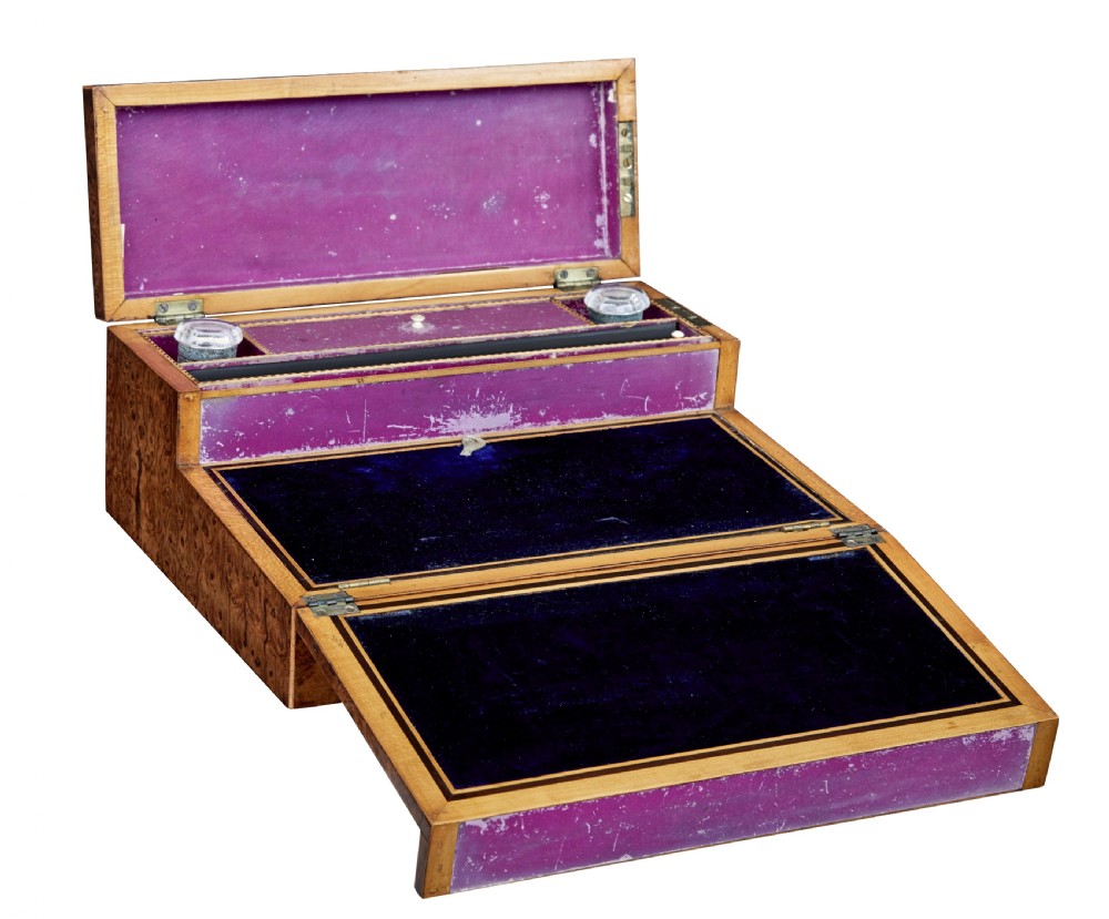 A nineteenth-century Victorian burr walnut writing slope featuring geometric inlaid border banding and a central oval cartouche. View II