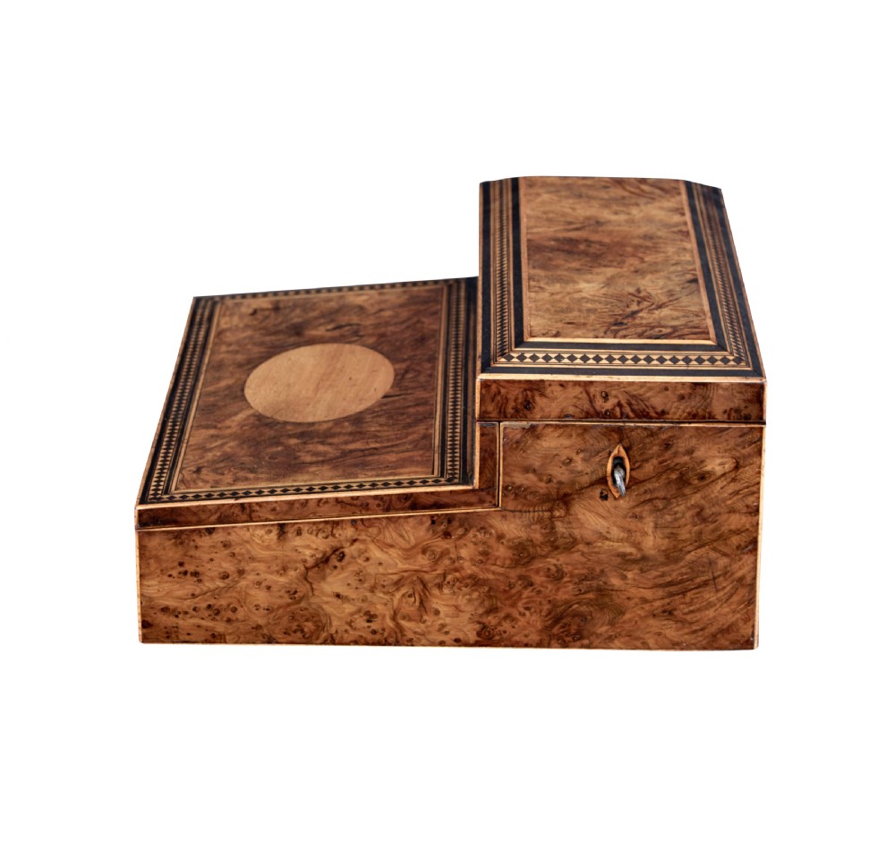 A nineteenth-century Victorian burr walnut writing slope featuring geometric inlaid border banding and a central oval cartouche. View VI