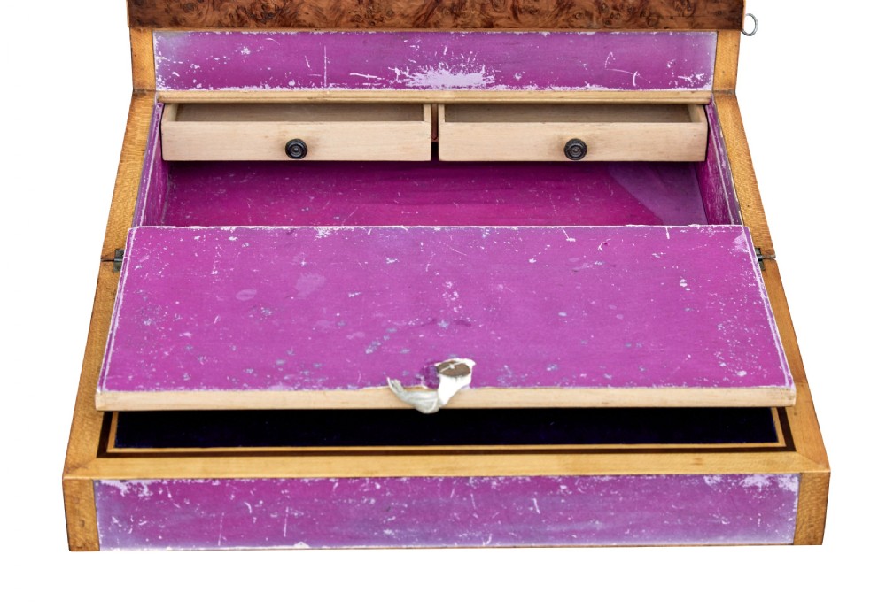 A nineteenth-century Victorian burr walnut writing slope featuring geometric inlaid border banding and a central oval cartouche. View VIII