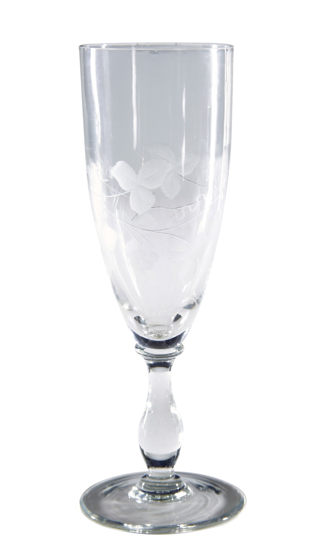 A nine-piece collection of clear 1930s glass stemware and tumblers with etched vine patterns arranged in a line. View III