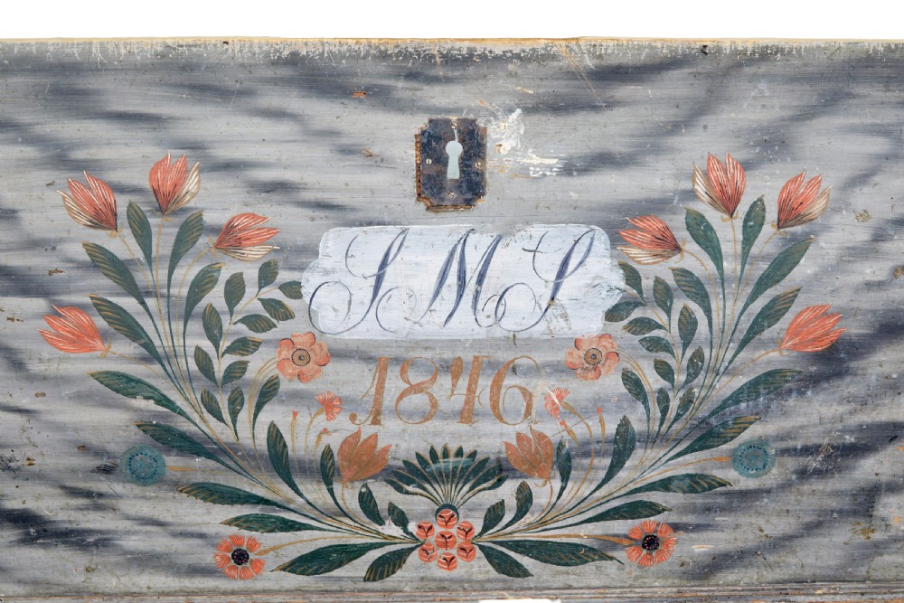 A mid-19th-century Swedish painted dome-top wooden chest featuring blue-grey grain painting, floral motifs, hand-wrought iron corner straps, and the date 1846. View III