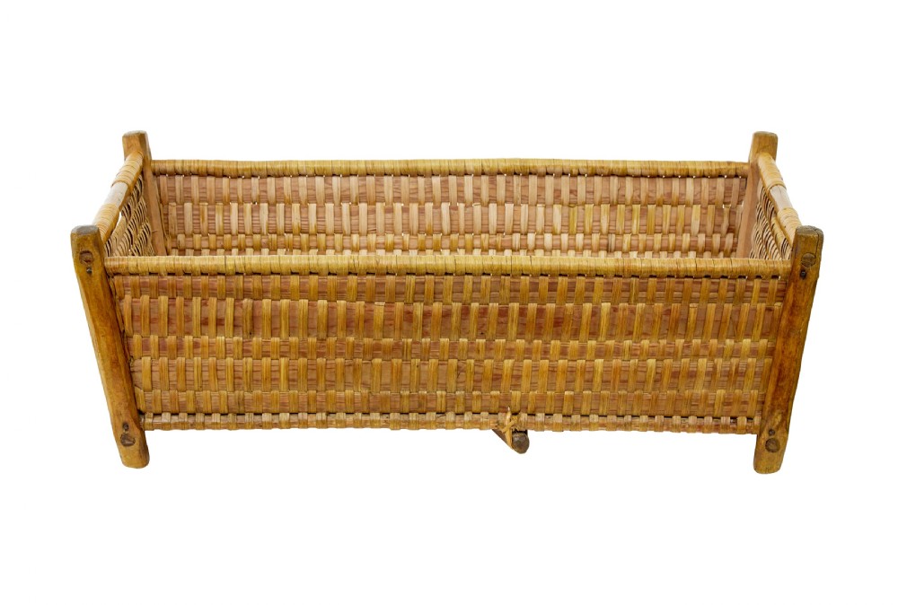 A rectangular nineteenth-century Scandinavian basket constructed from woven pine splints with raised wooden corner supports. View IV