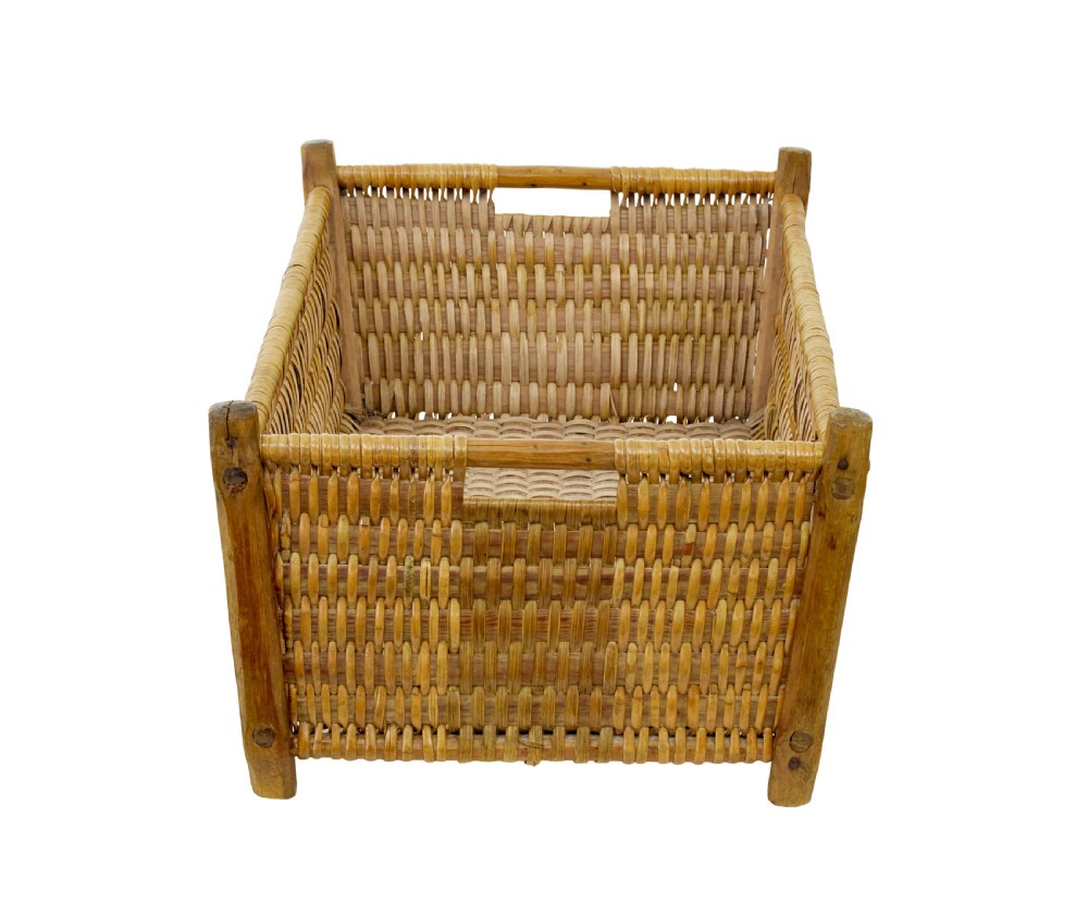 A rectangular nineteenth-century Scandinavian basket constructed from woven pine splints with raised wooden corner supports. View V