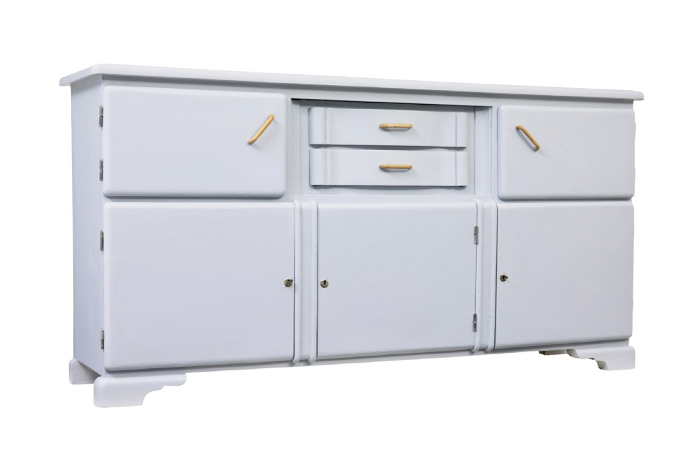 A pale blue-grey painted pine kitchen sideboard featuring five panelled cupboard doors and two central stacked drawers.