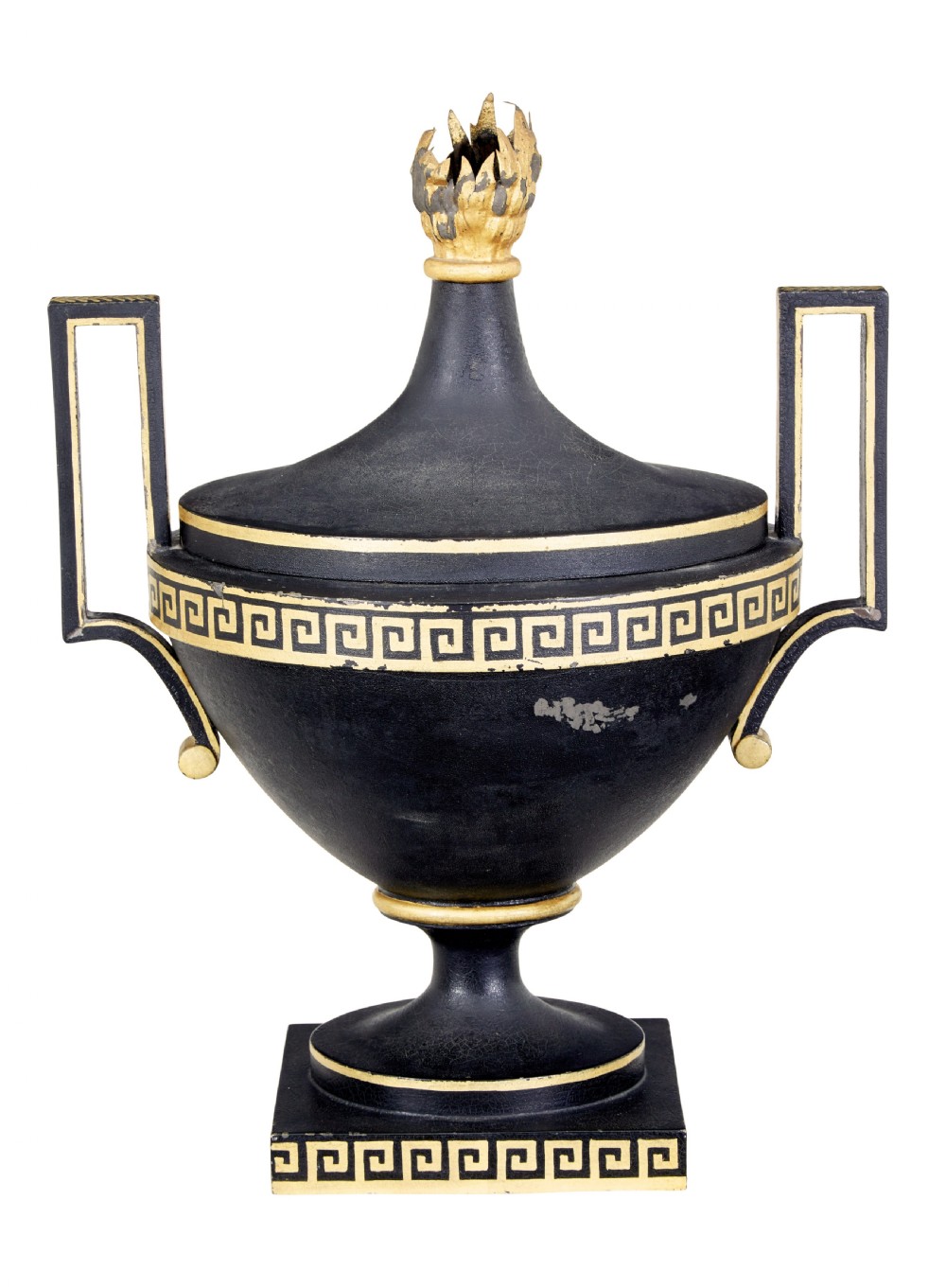 An early 19th-century black painted metal toleware urn with gilded Greek key decoration, angular handles, and a flame finial on a square plinth. View V
