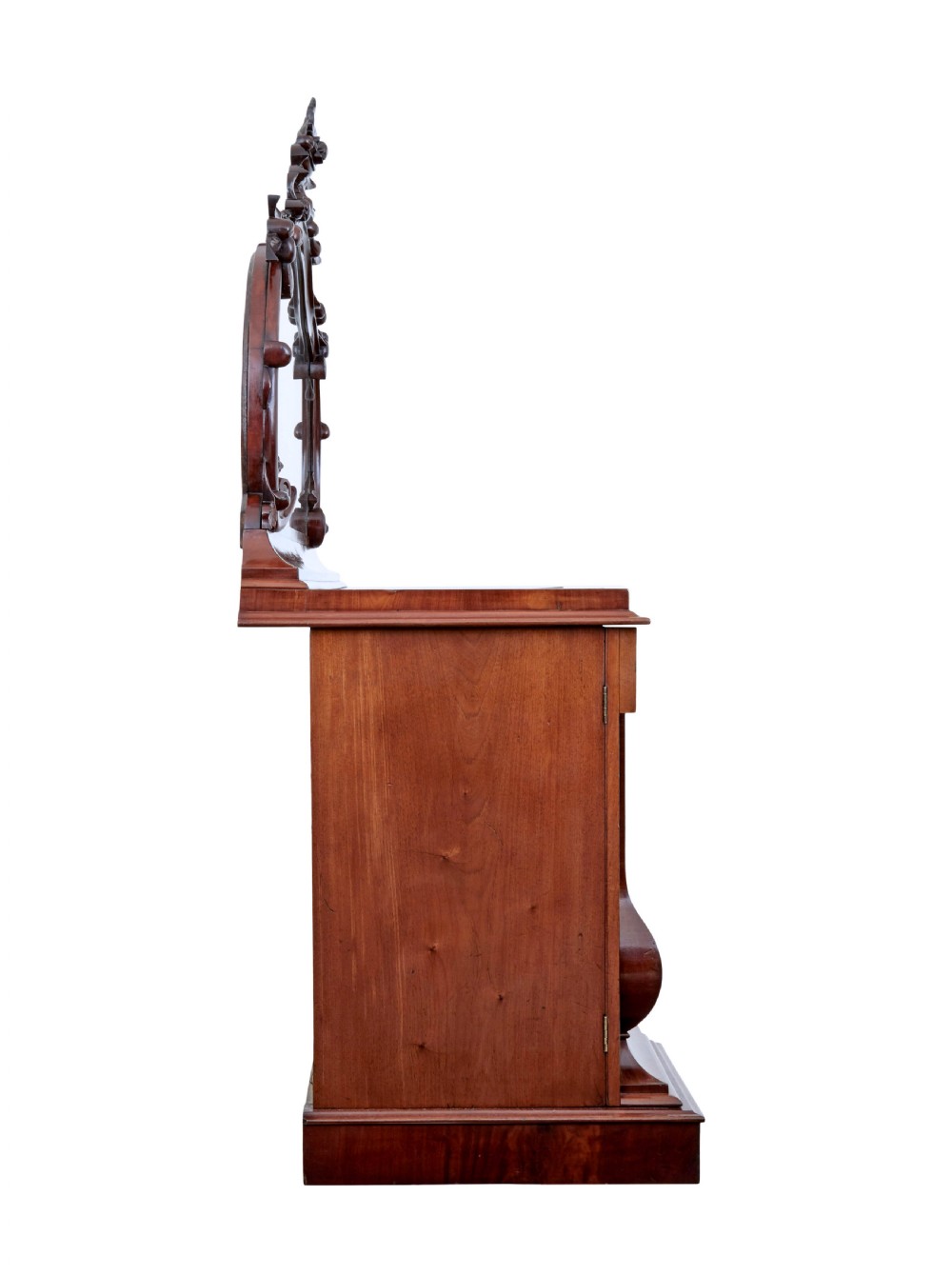 A Victorian flame mahogany sideboard featuring a carved botanical frame around an oval mirror top above cupboard doors and pedestal bases. View IV
