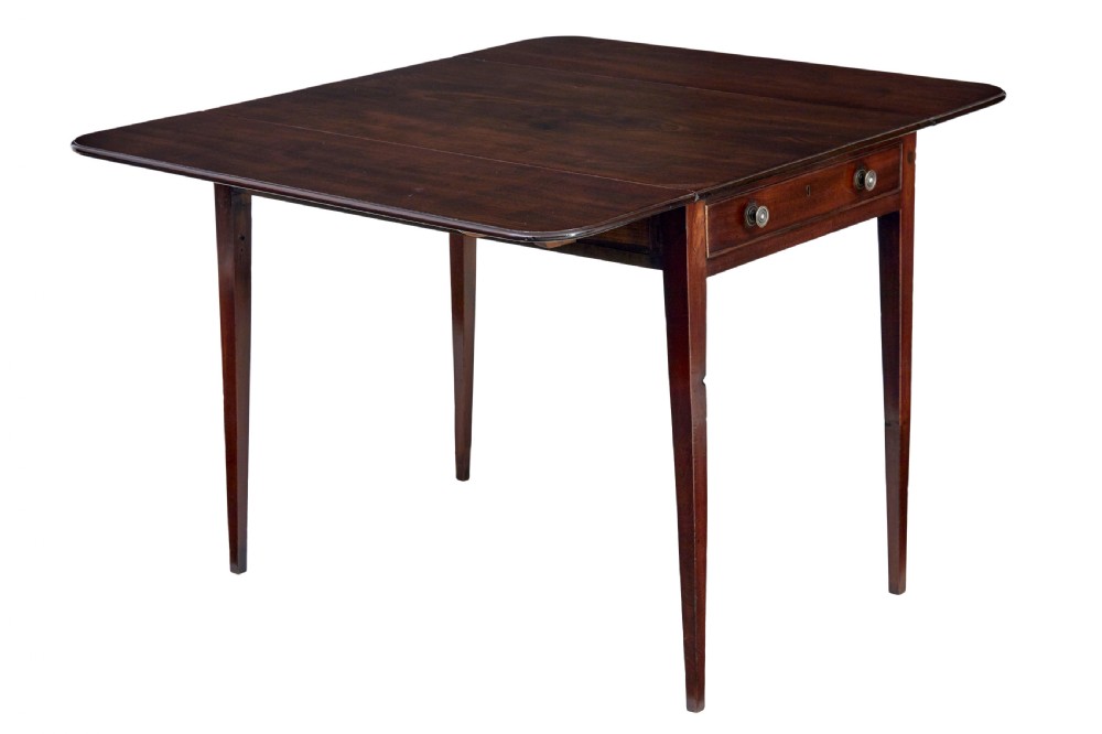 An early 19th-century mahogany Pembroke table featuring two drop-leaf flaps, a single end drawer with circular brass pull handles, and square tapered legs. View II