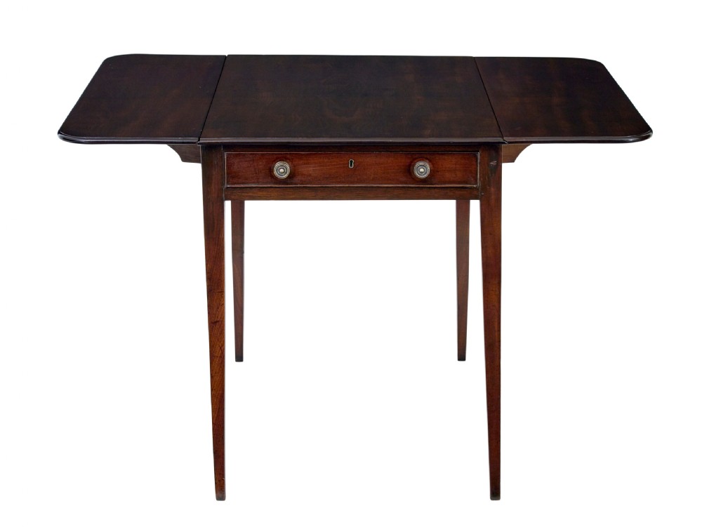 An early 19th-century mahogany Pembroke table featuring two drop-leaf flaps, a single end drawer with circular brass pull handles, and square tapered legs. View III