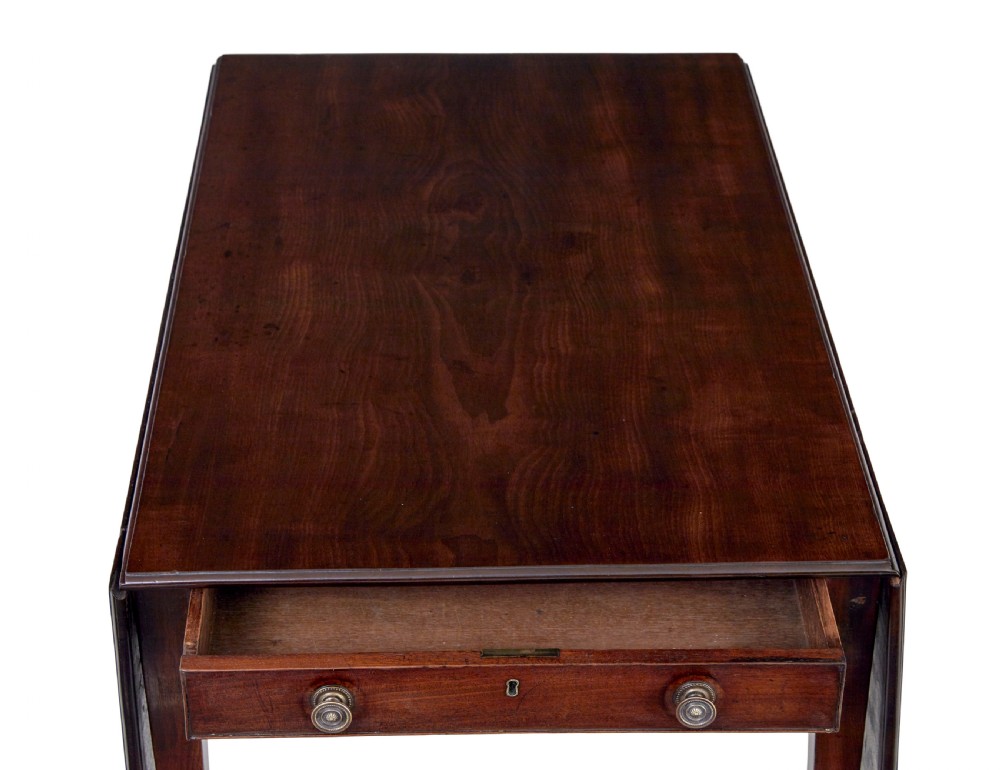 An early 19th-century mahogany Pembroke table featuring two drop-leaf flaps, a single end drawer with circular brass pull handles, and square tapered legs. View VIII