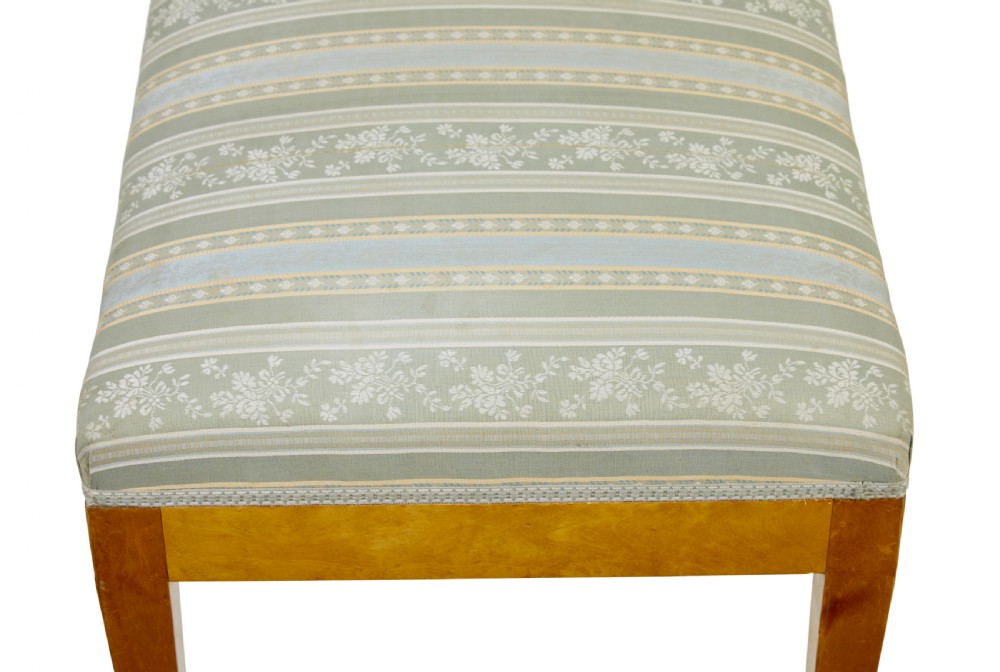 An early 20th-century Swedish long stool made of light honey-coloured birch wood with six square tapered legs and light blue striped upholstered seat. View VIII