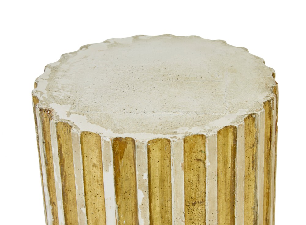 An early 20th-century Scandinavian architectural column pedestal featuring a vertical fluted design in distressed gold leaf and cream painted finish set on a square base. View V
