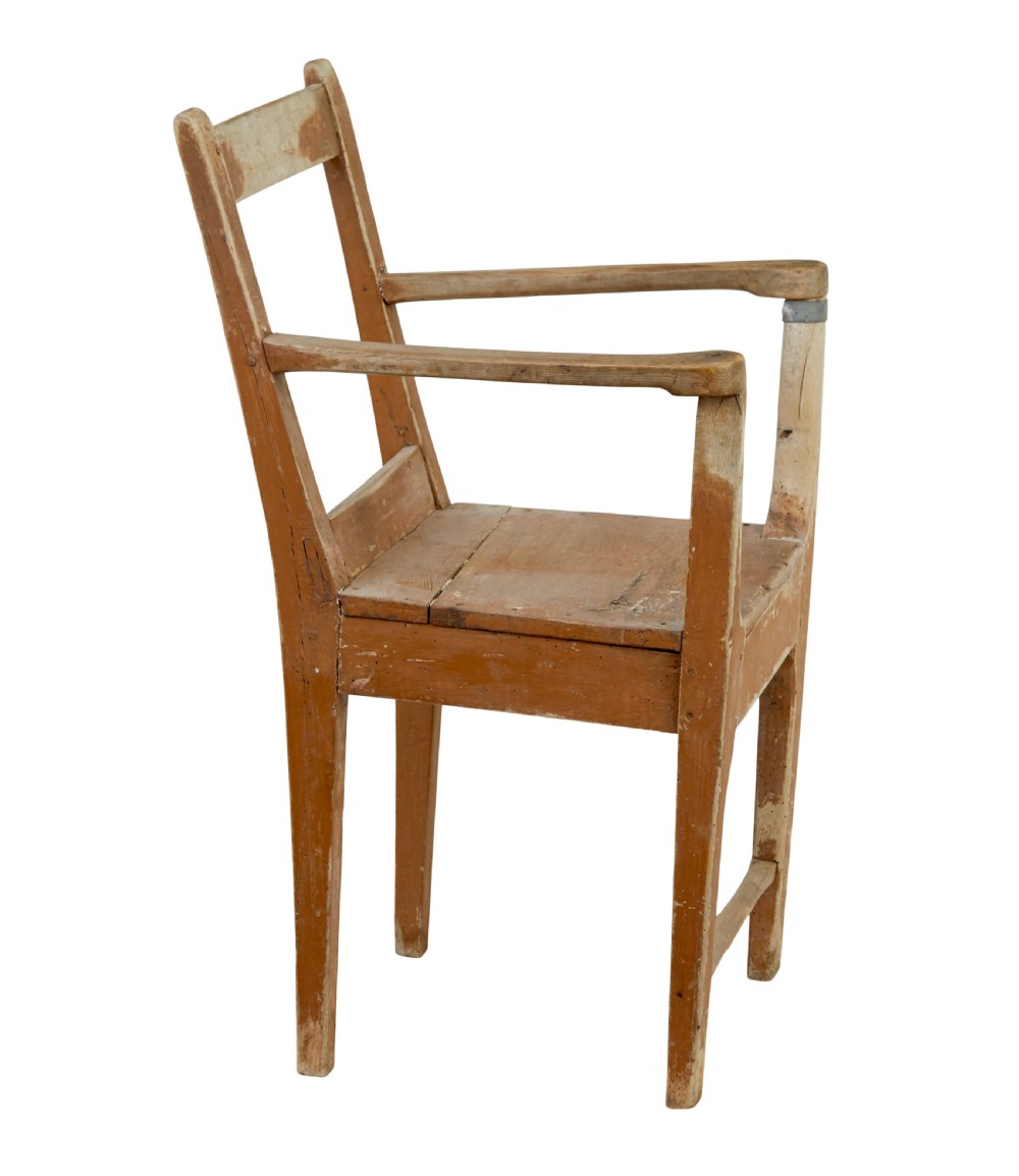 An early nineteenth-century Swedish childs armchair featuring a distressed reddish-brown painted finish over pine, straight legs, and flat armrests. View IV