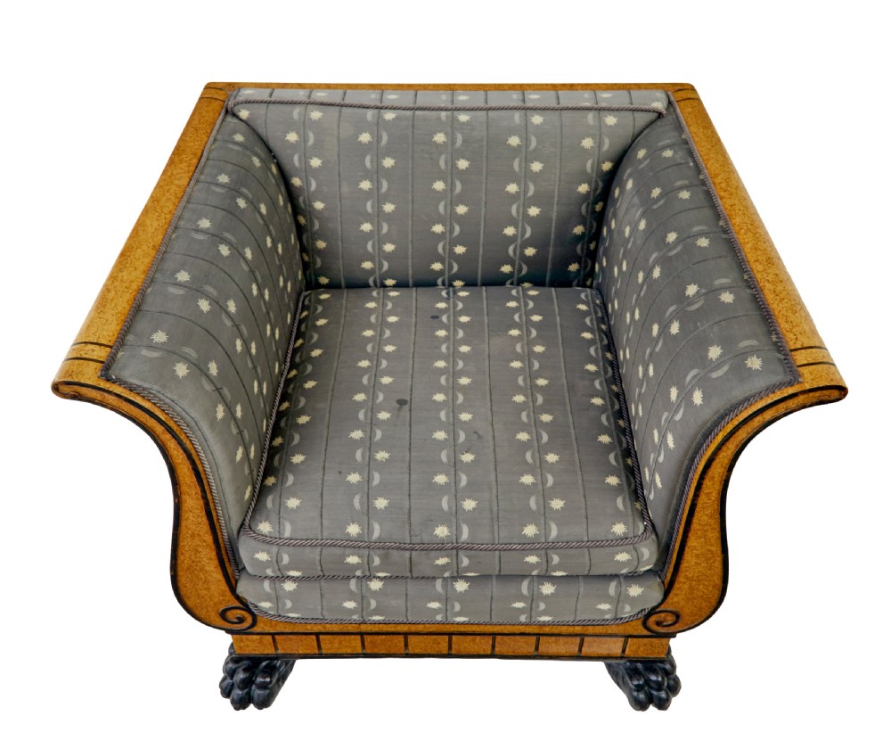 A pair of Art Deco armchairs featuring flared burr birch frames, grey upholstered cushions with a pattern motif, and ebonised carved feet. View VIII