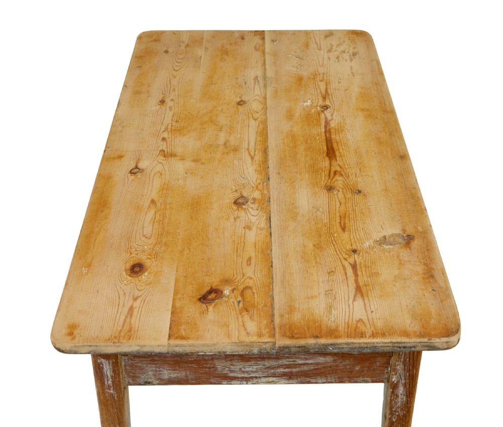 A nineteenth-century Swedish pine side table featuring a rectangular plank top, tapered square legs, and a scraped wood finish. View VII