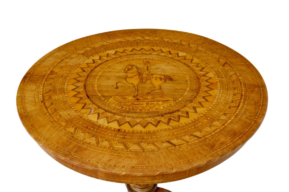 A 19th-century round walnut pedestal table featuring intricate Sorrento marquetry inlay on the tabletop and a turned column supported by a tripod base. View IV