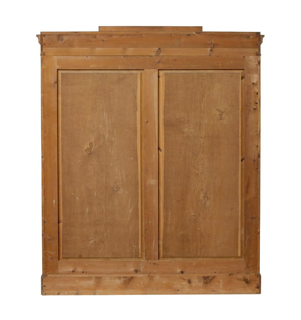 An early 20th-century Swedish Empire Revival open bookcase crafted from golden satin birch with a stepped cornice and ebonised diamond motif. View V