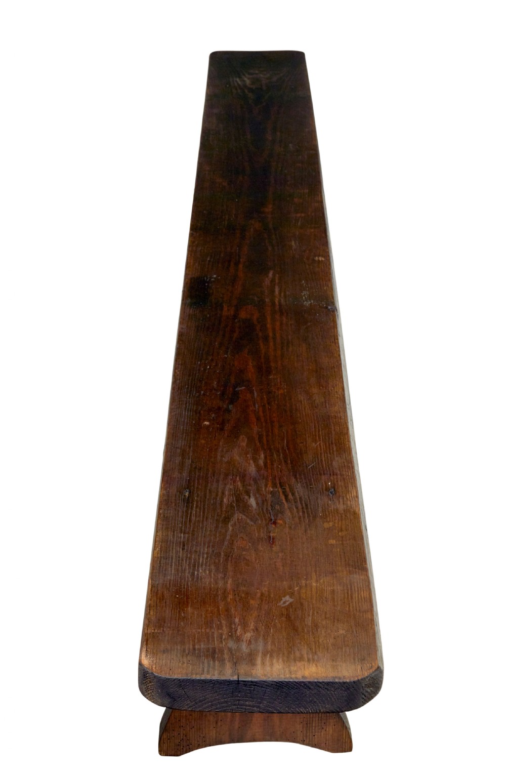 A pair of long early twentieth-century dark pine wooden benches with trestle-style legs. View IV