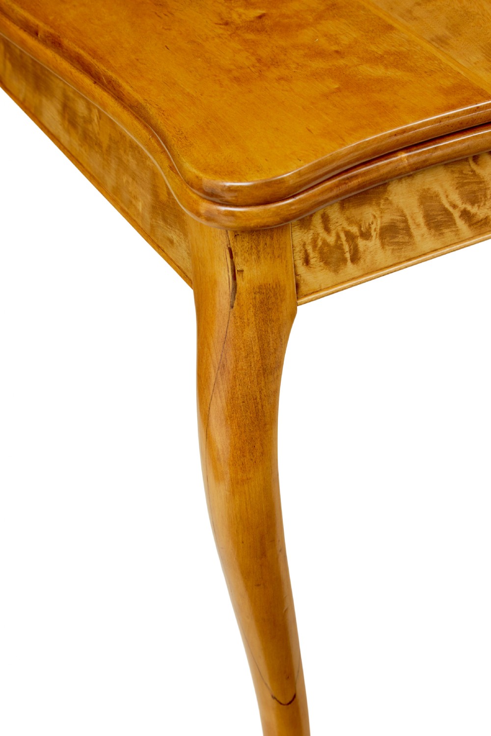 A 19th-century Swedish Rococo Revival tea table crafted from highly figured golden birch with cabriole legs and a fold-over top. View XII