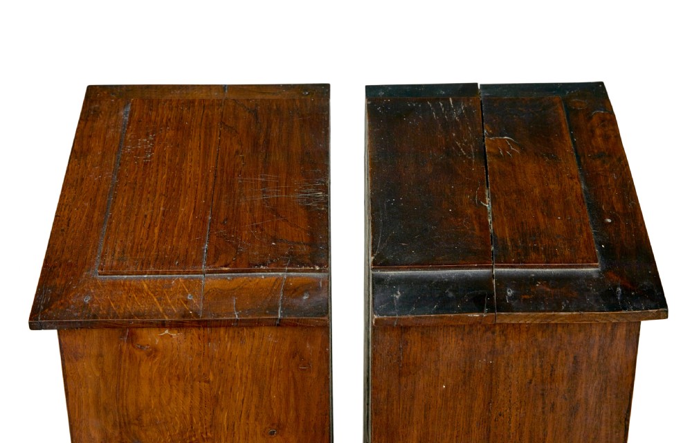A pair of antique warm brown oak tabletop cabinets featuring glazed doors, brass keyhole escutcheons, and two internal drawers with decorative brass handles. View VIII