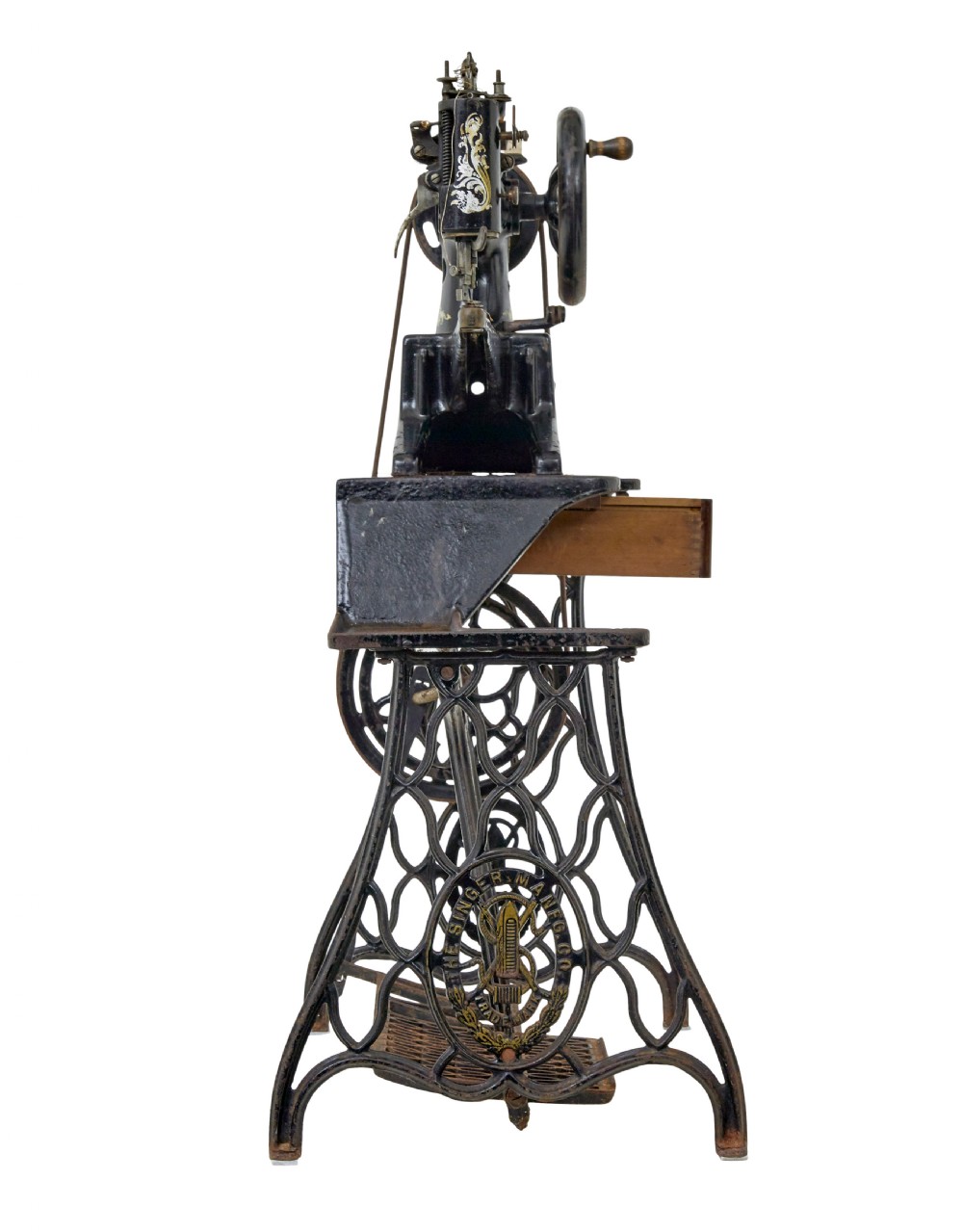 A 19th-century black cast iron Singer industrial treadle sewing machine with openwork frame and gilded lettering. View IV
