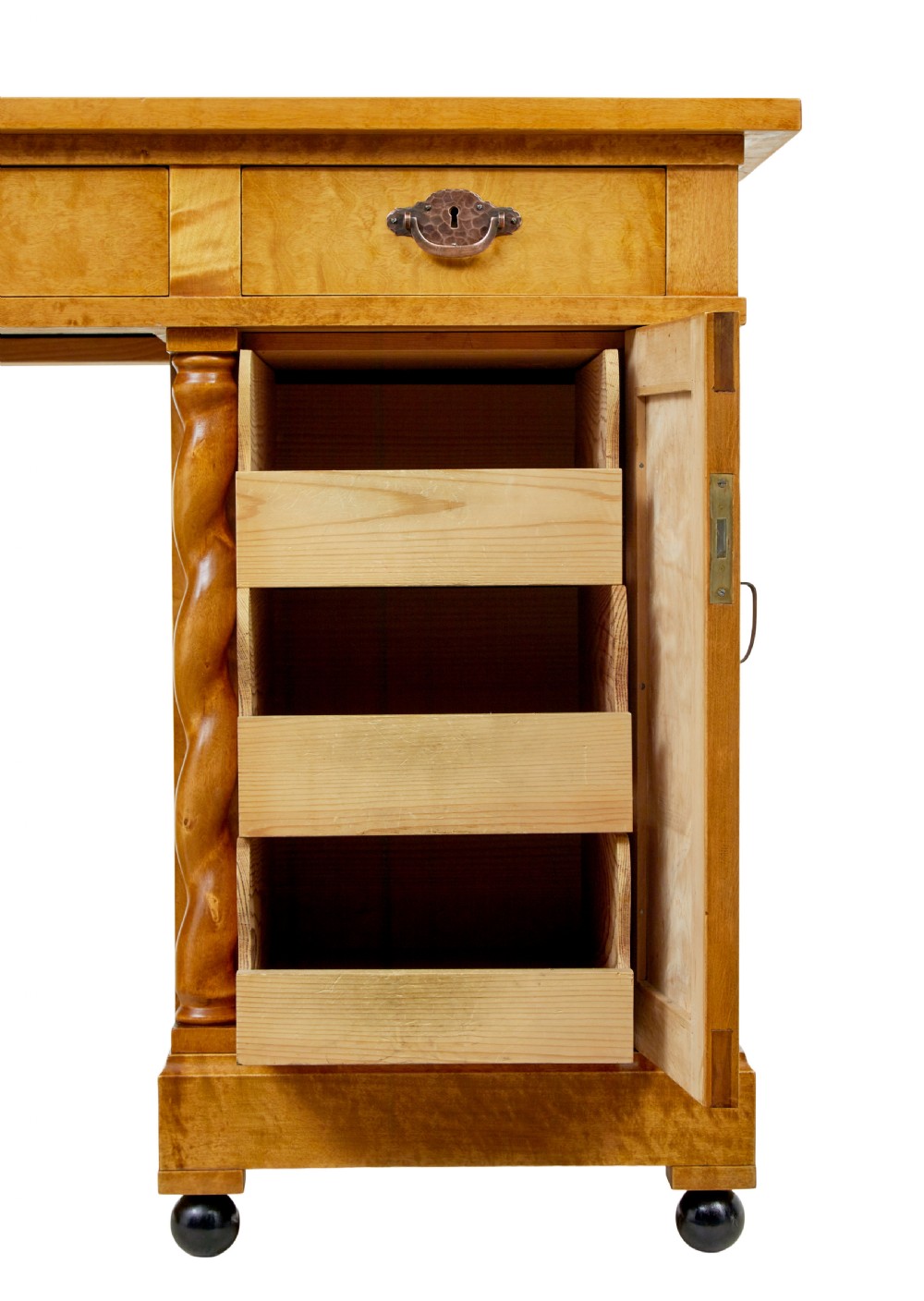 A Swedish early 20th-century pedestal desk crafted from golden flame birch wood featuring barley twist corner columns and spherical black feet. View VIII