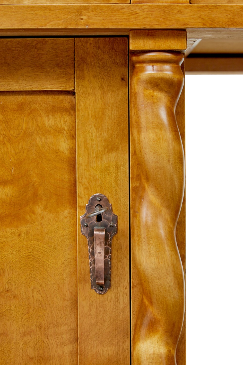 A Swedish early 20th-century pedestal desk crafted from golden flame birch wood featuring barley twist corner columns and spherical black feet. View IX