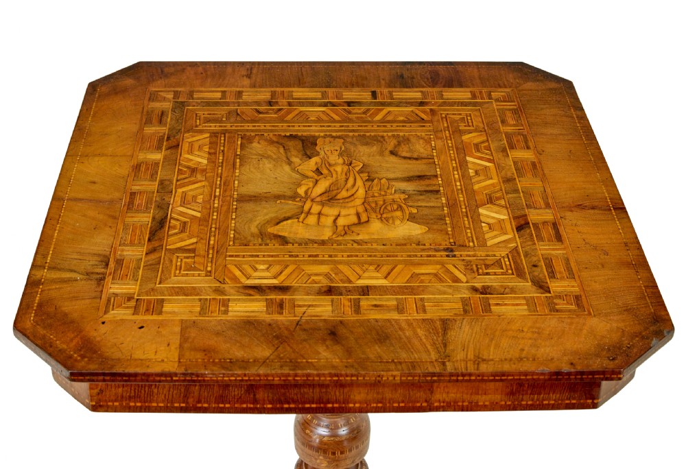 A 19th-century Italian walnut side table featuring an intricate marquetry inlaid top, turned pedestal column, and tripod legs. View II