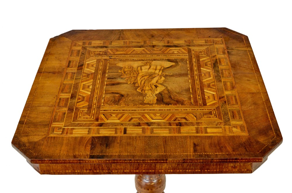 A 19th-century Italian walnut side table featuring an intricate marquetry inlaid top, turned pedestal column, and tripod legs. View III