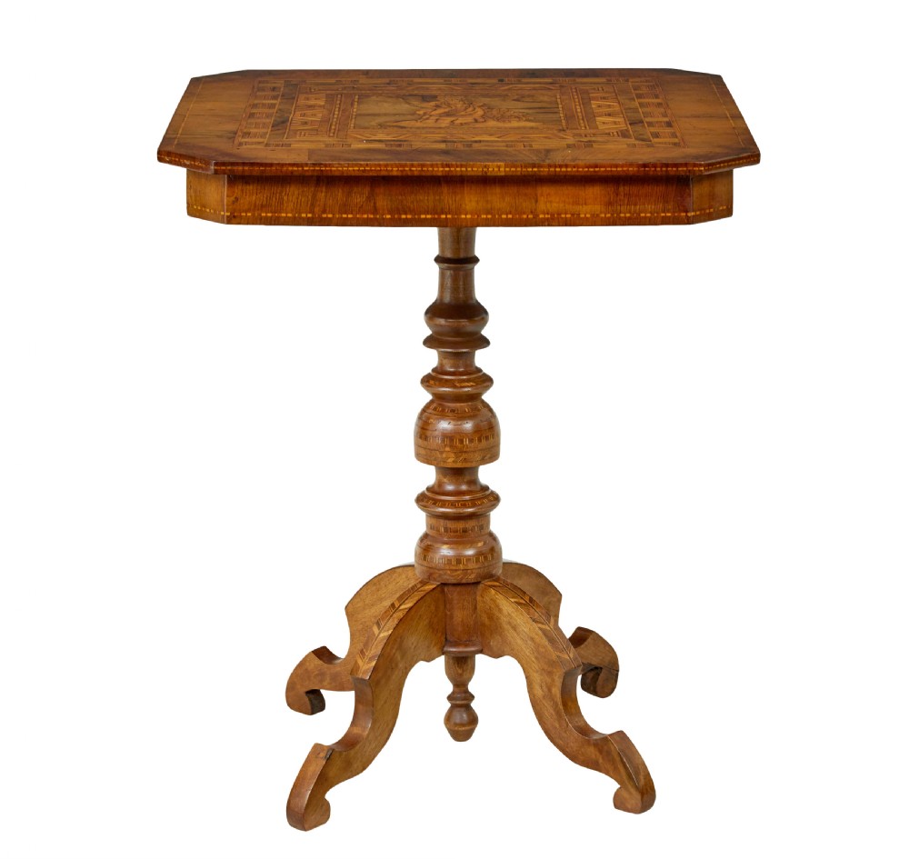 A 19th-century Italian walnut side table featuring an intricate marquetry inlaid top, turned pedestal column, and tripod legs. View V