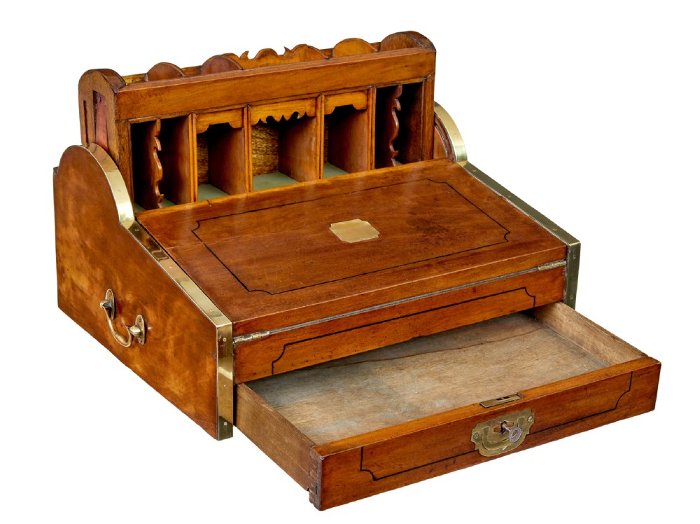 A 19th-century camphor wood campaign writing slope featuring a slatted tambour top, brass corner strapping, side carrying handles, and line inlay details. View II