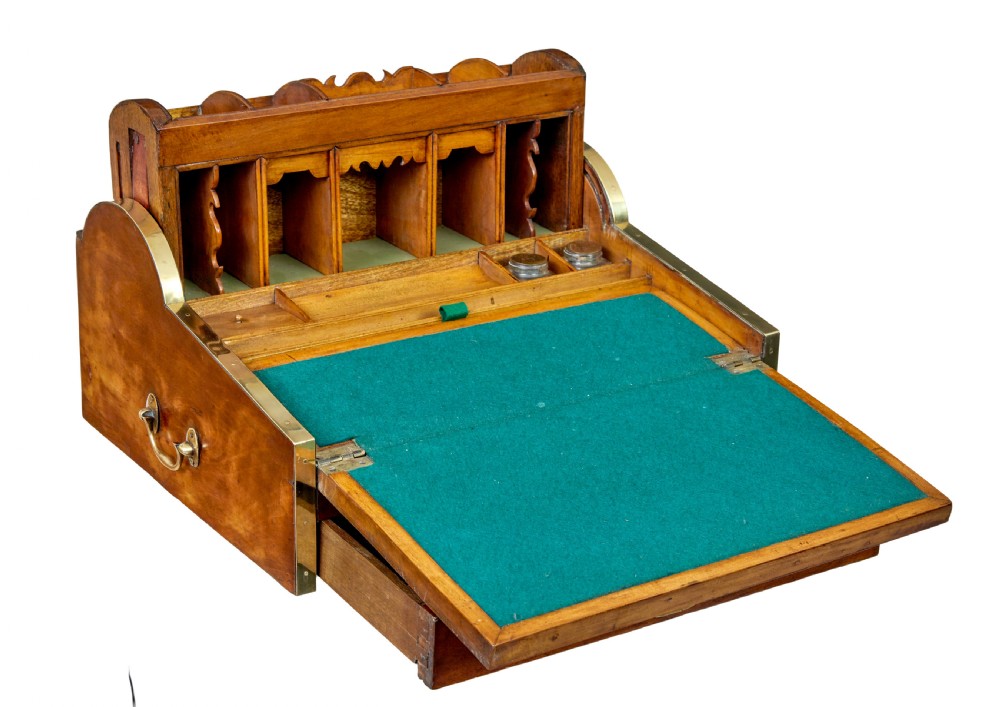 A 19th-century camphor wood campaign writing slope featuring a slatted tambour top, brass corner strapping, side carrying handles, and line inlay details. View III