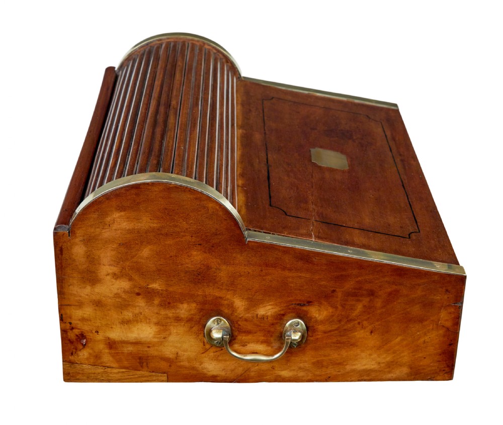 A 19th-century camphor wood campaign writing slope featuring a slatted tambour top, brass corner strapping, side carrying handles, and line inlay details. View VIII