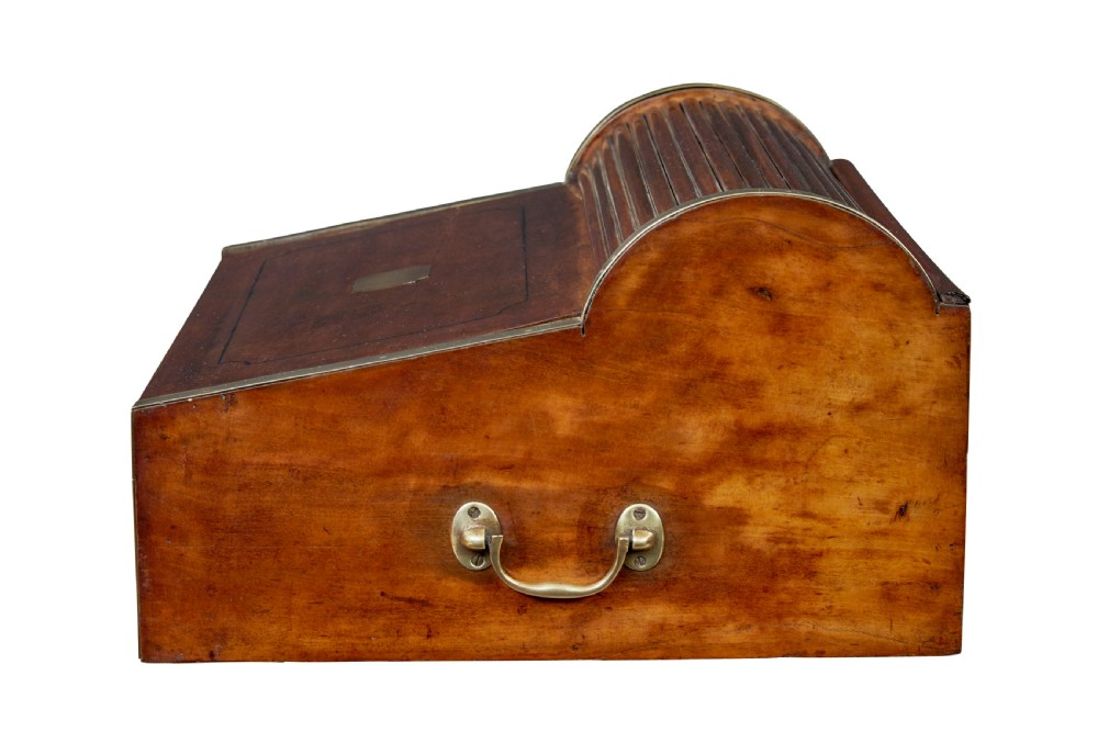 A 19th-century camphor wood campaign writing slope featuring a slatted tambour top, brass corner strapping, side carrying handles, and line inlay details. View X