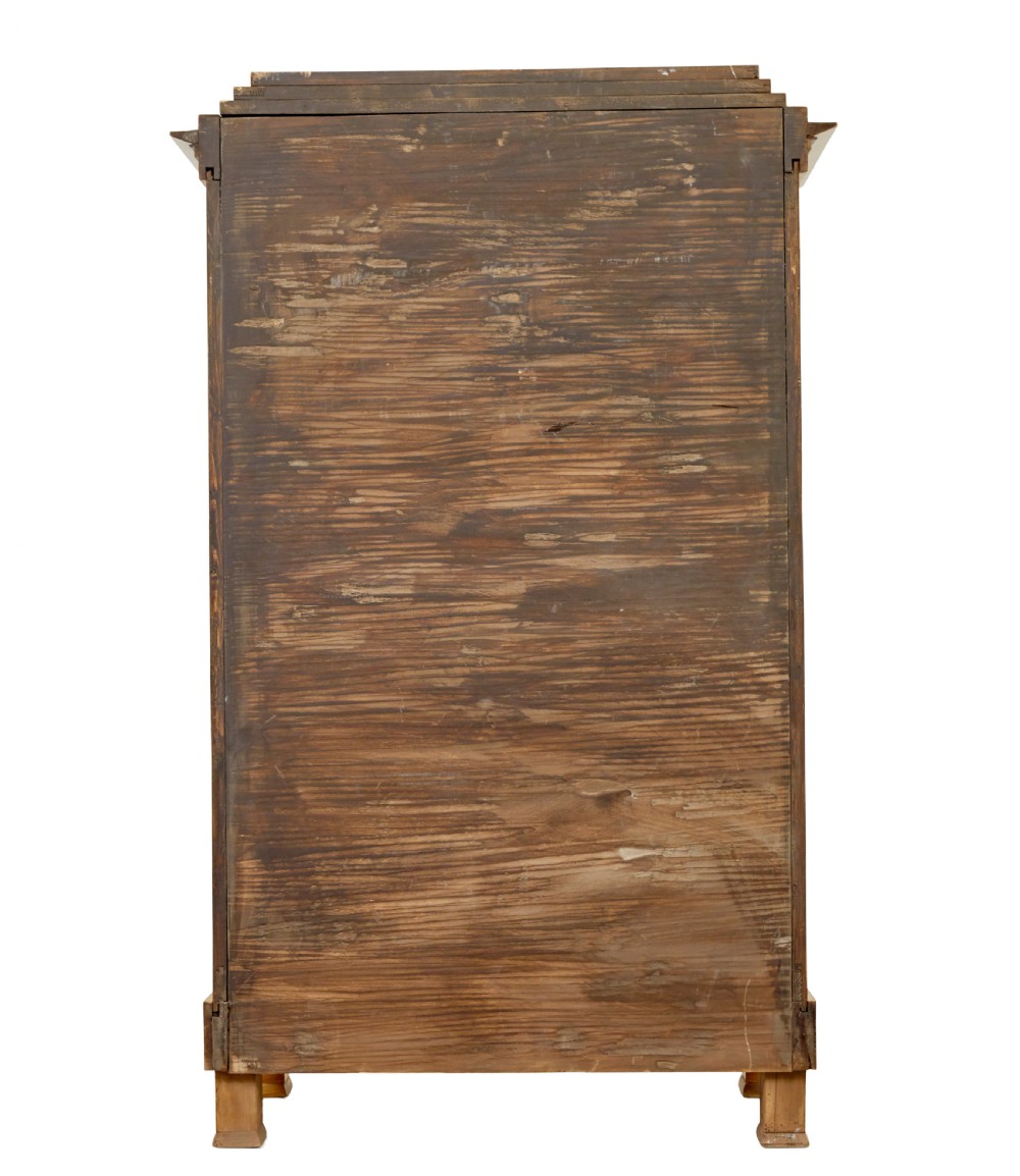 A matching pair of Biedermeier elm display cabinets with glazed doors, side columns, and stepped cornices. View VI
