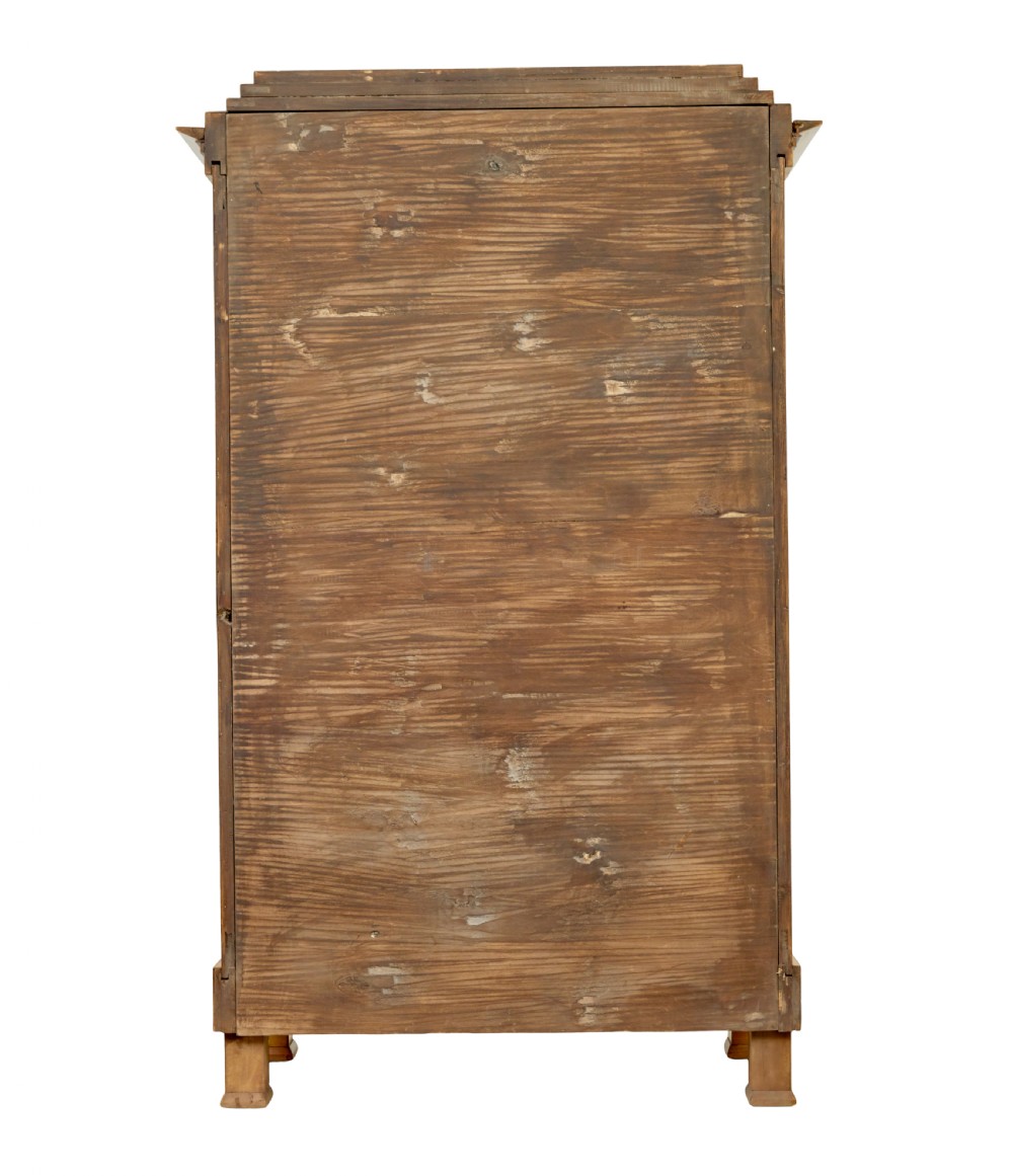A matching pair of Biedermeier elm display cabinets with glazed doors, side columns, and stepped cornices. View VII