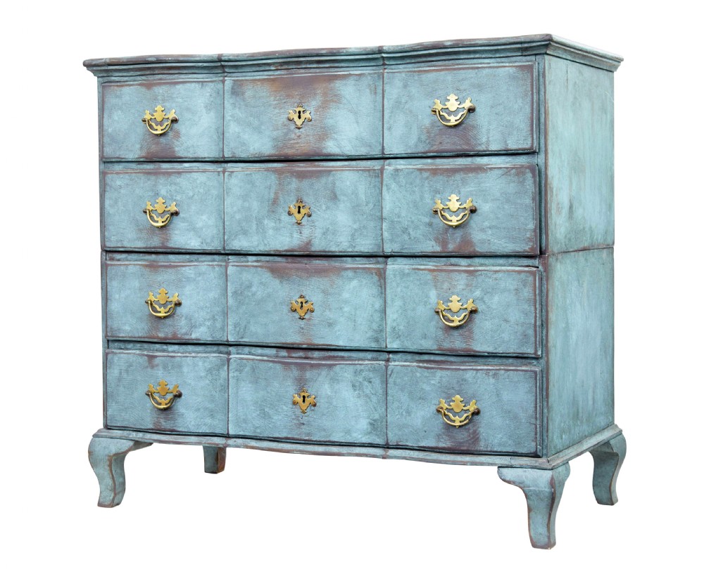 An 18th-century Scandinavian Baroque chest of drawers with four long drawers, brass handles, and a distressed blue-green painted finish.
