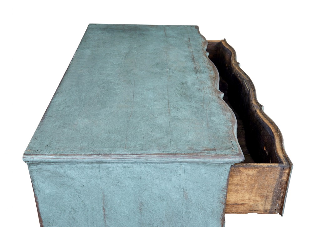An 18th-century Scandinavian Baroque chest of drawers with four long drawers, brass handles, and a distressed blue-green painted finish. View III