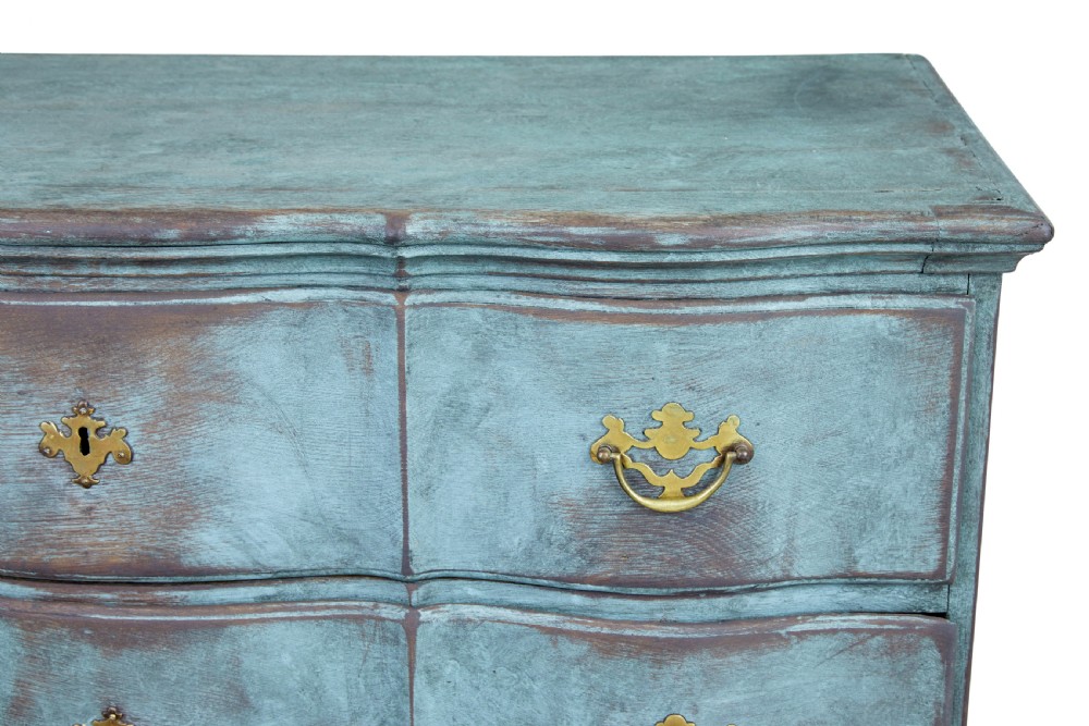 An 18th-century Scandinavian Baroque chest of drawers with four long drawers, brass handles, and a distressed blue-green painted finish. View V