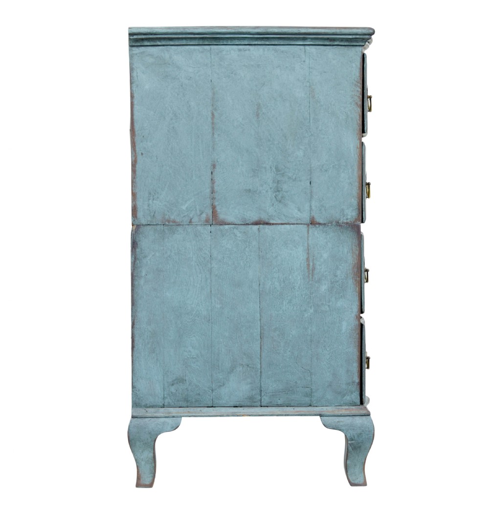 An 18th-century Scandinavian Baroque chest of drawers with four long drawers, brass handles, and a distressed blue-green painted finish. View X