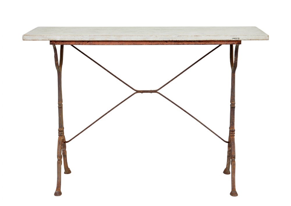 A late 19th-century French side table with a rectangular white marble top set on an oxidised rust-brown cast iron frame with X-bracing. View III
