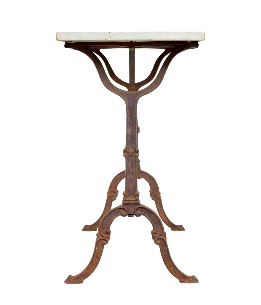 A late 19th-century French side table with a rectangular white marble top set on an oxidised rust-brown cast iron frame with X-bracing. View IV