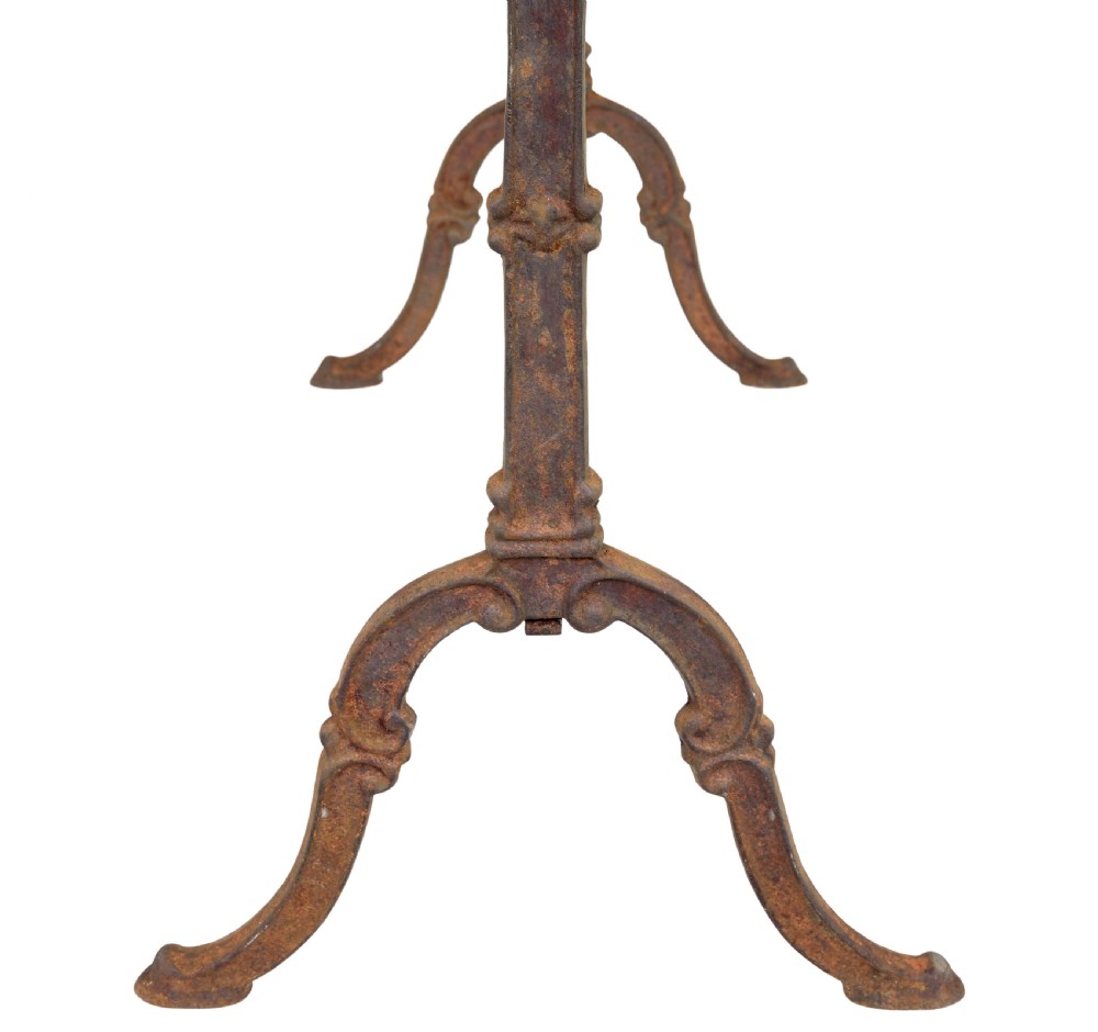 A late 19th-century French side table with a rectangular white marble top set on an oxidised rust-brown cast iron frame with X-bracing. View V