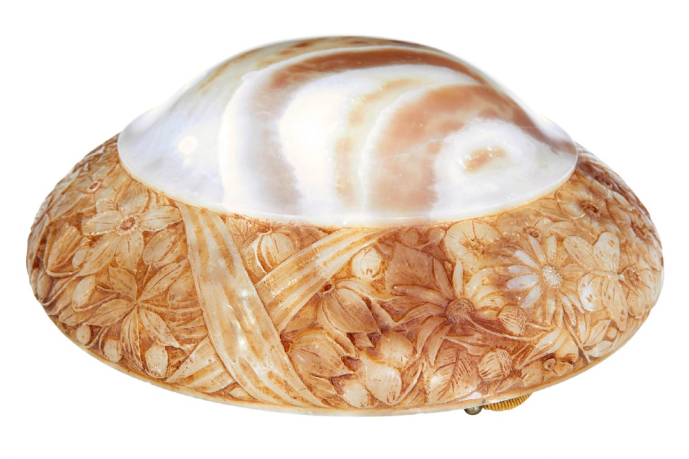 A carved warm amber alabaster ceiling bowl light suspended by three woven cords with a textured canopy. View III
