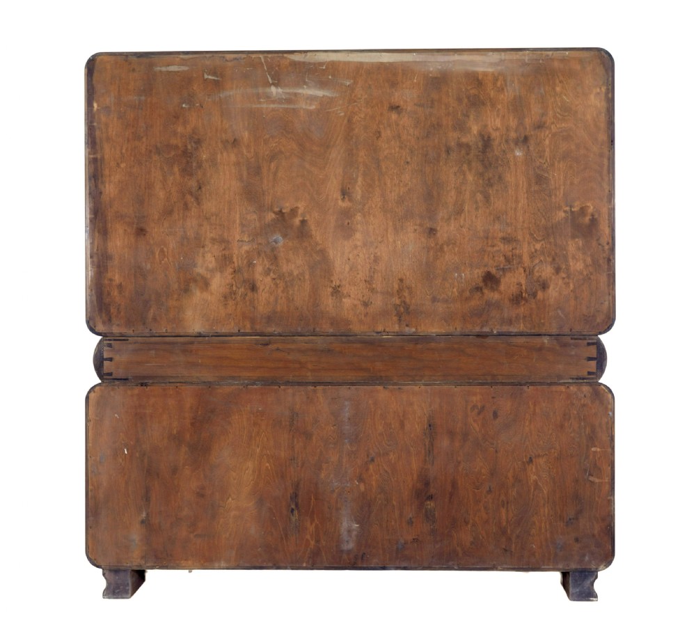 A Scandinavian Art Deco cabinet in blonde birch and elm veneer with two upper doors, a central reeded waist band, and two lower doors. View V