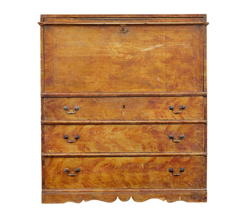 A 19th-century Swedish painted pine escritoire featuring a fall-front top section above three long drawers, finished in a faux-wood grain paint with brass drop handles and a scalloped plinth base. View II